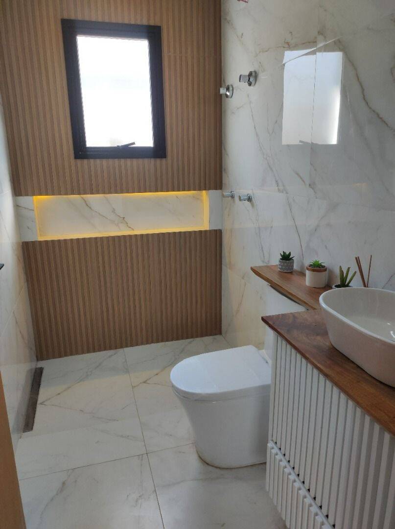 Casa com 3 dormitórios à venda, 135 m² por R$ 950.000 - Residencial Malibu - Caçapava/SP
