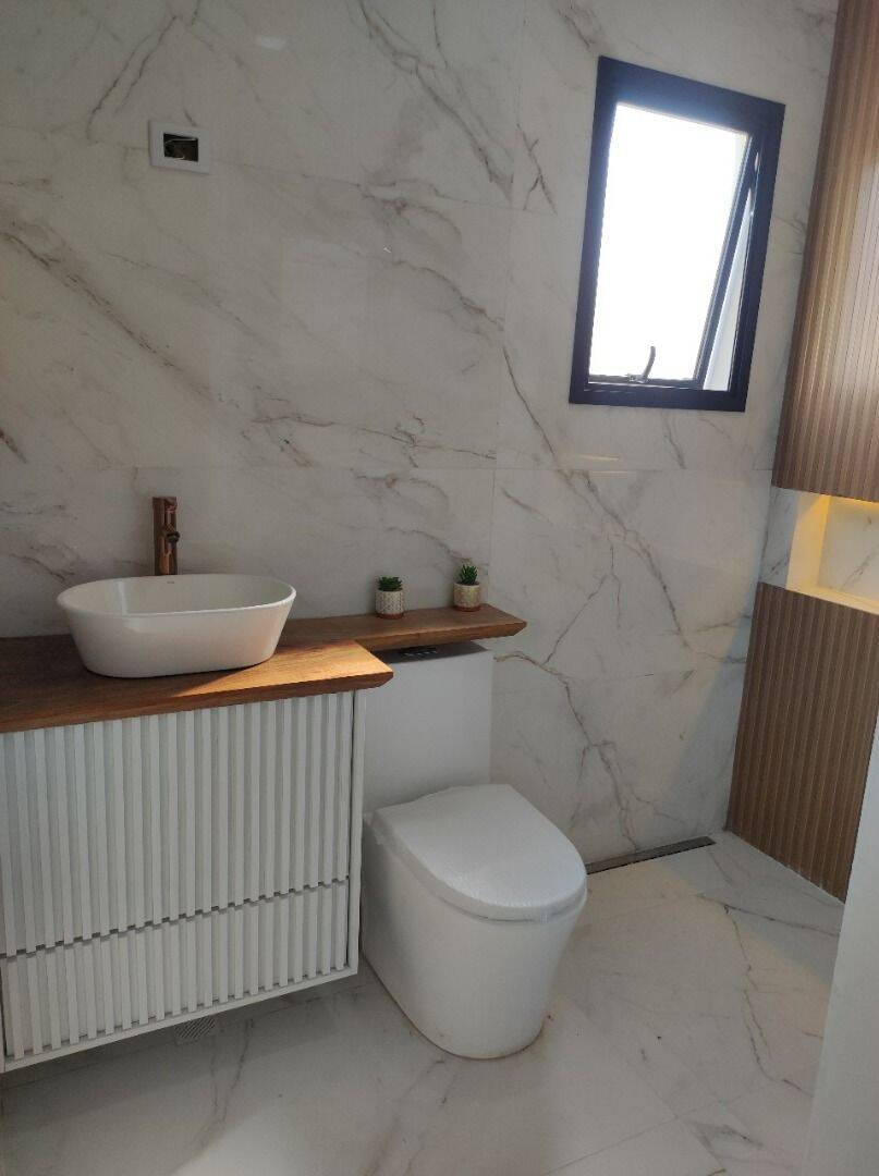 Casa com 3 dormitórios à venda, 135 m² por R$ 950.000 - Residencial Malibu - Caçapava/SP