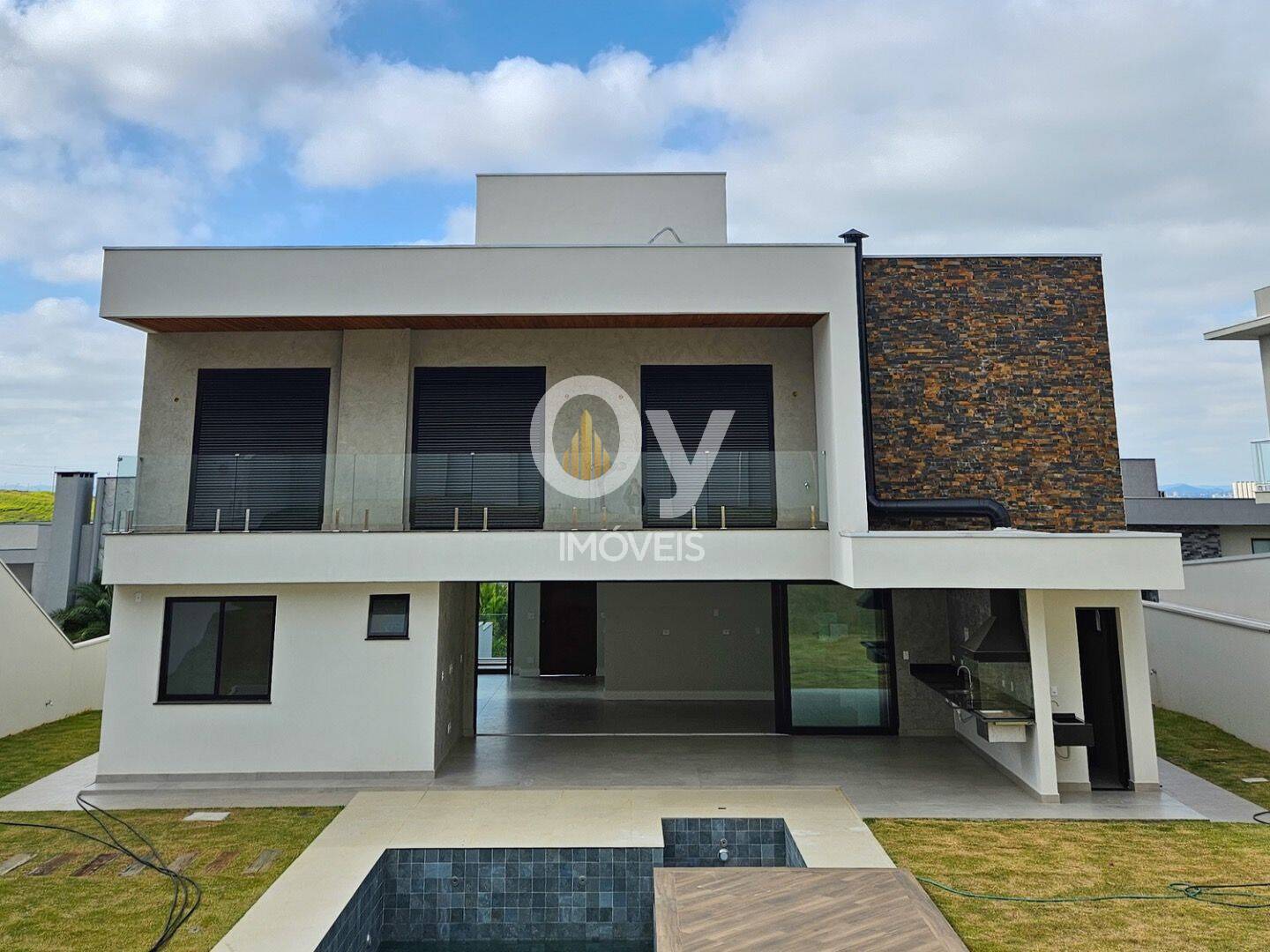 Sobrado com 4 dormitórios à venda, 450 m² por R$ 4.000.000,00 - Condomínio Reserva do Paratehy - São José dos Campos/SP